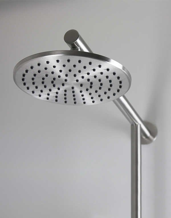Detail of shower column with sliding rail stainless steel inox 316L, pulling diverter with automatic return, hand shower with l. 160cm flexible tube and inspectionable shower head Ø20cm, finish 022 - brushed